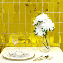 A gold metallic foil rectangle shaped design foil curtain