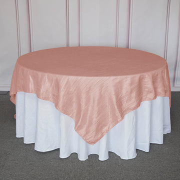Add Elegance and Charm with the Dusty Rose Accordion Crinkle Taffeta Square Table Overlay