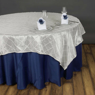 Elevate Your Event Decor with Ivory Pintuck Square Table Overlay