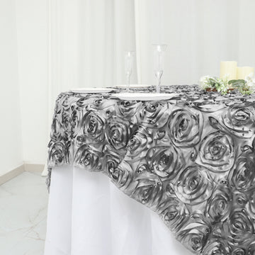 Create Unforgettable Tablescapes with the Silver 3D Rosette Satin Square Table Overlay