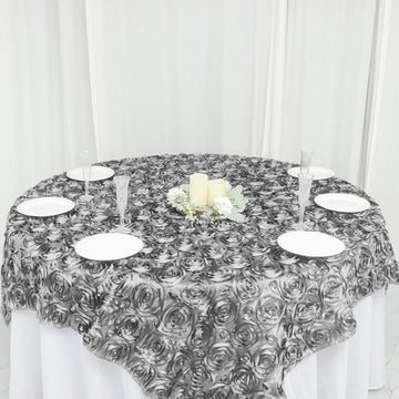 Add a Touch of Glamour with the Silver 3D Rosette Satin Square Table Overlay