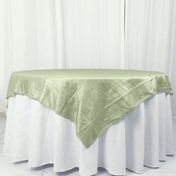 Elevate Your Event with the Sage Green Accordion Crinkle Taffeta Table Overlay