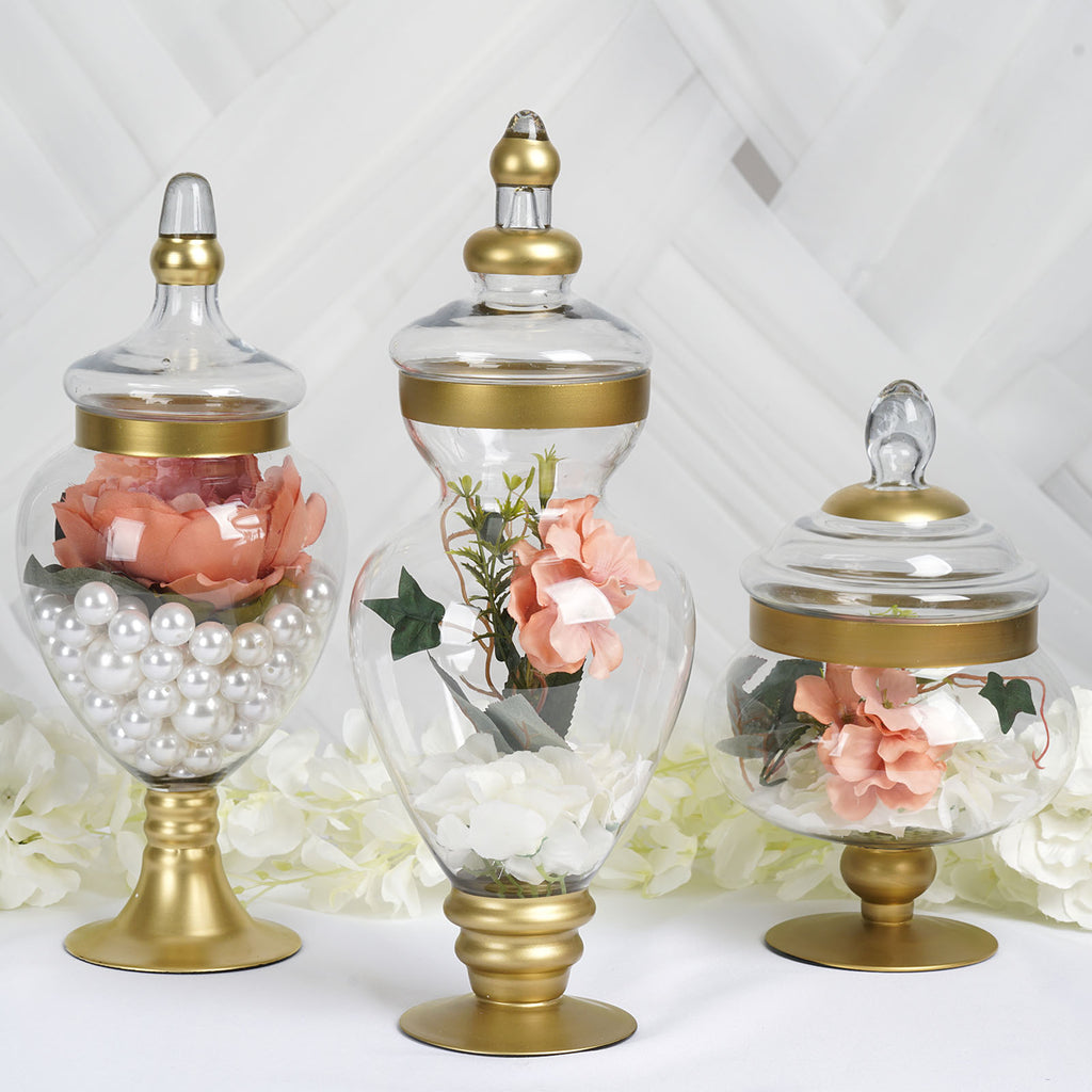http://www.efavormart.com/cdn/shop/products/Large-Gold-Trim-Glass-Apothecary-Party-Favor-Candy-Jars-With-Snap-On-Lids_1024x1024.jpg?v=1689405967