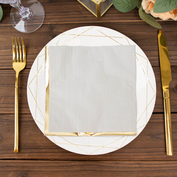 Gray Soft 2 Ply Paper Beverage Napkins with Gold Foil Edge - Perfect for Any Occasion