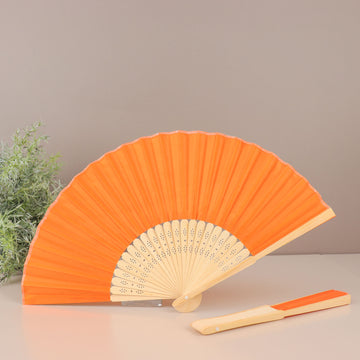 Add Vibrant Elegance to Your Decor with Orange Asian Silk Folding Fans