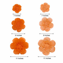Floral Backdrop Décor: Different sizes of orange paper peony flowers