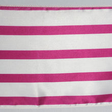 A close up of satin & taffeta chair sashes in pink and white striped fabric#whtbkgd