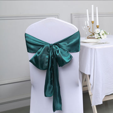 Elevate Your Event with Peacock Teal Satin Chair Sashes