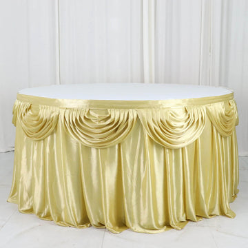 Create a Luxurious Atmosphere with the Champagne Pleated Satin Double Drape Table Skirt
