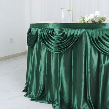 Unleash the Beauty of Your Event Décor with the Hunter Emerald Green Pleated Satin Double Drape Table Skirt