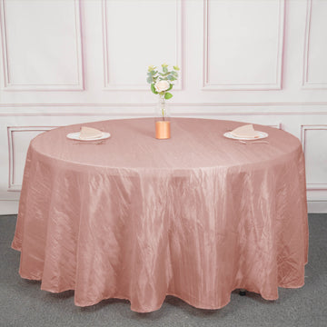 Add Elegance to Your Event with the Dusty Rose Seamless Accordion Crinkle Taffeta Round Tablecloth 120