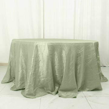 Elevate Your Event with the Sage Green Seamless Accordion Crinkle Taffeta Round Tablecloth 132