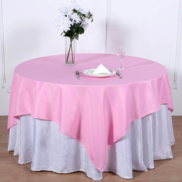 Add Elegance to Your Event with the Pink Square Seamless Polyester Table Overlay 70"x70"