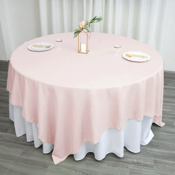 Elevate Your Event with the Blush Square Polyester Table Overlay