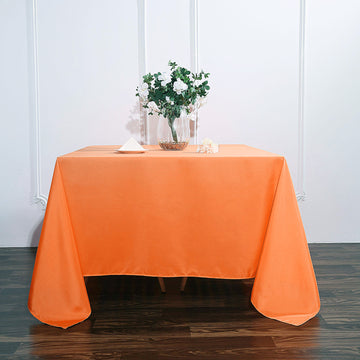 Upgrade Your Table with the Vibrant Orange Square Polyester Tablecloth