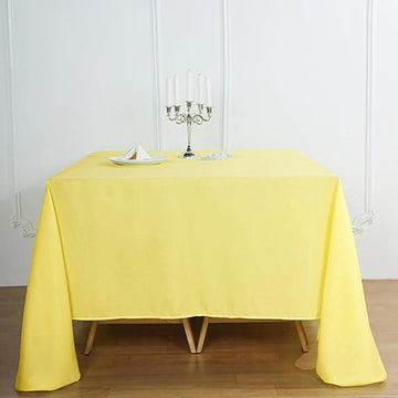 Elevate Your Event Decor with the Yellow Seamless Square Polyester Tablecloth 90"x90"