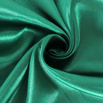 Create a Festive Atmosphere with the Hunter Emerald Green Seamless Satin Round Tablecloth