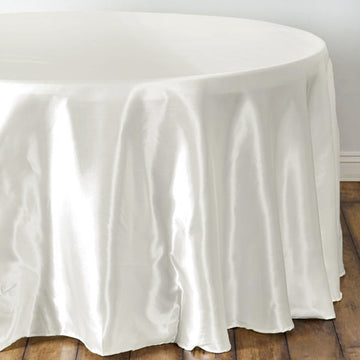 Dress Your Tables to Perfection with our Ivory Satin Round Tablecloth