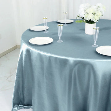 Create an Enchanting Atmosphere with the Dusty Blue Seamless Satin Round Tablecloth 132