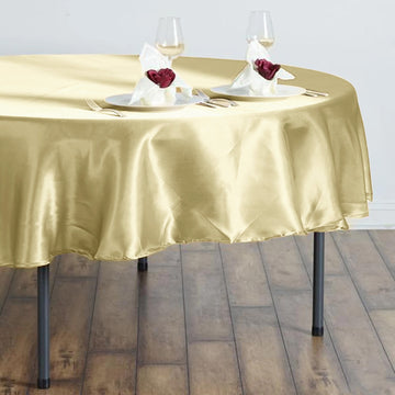 Create a Luxurious Atmosphere with the Champagne Seamless Satin Round Tablecloth