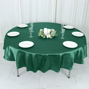 Create a Stunning Emerald Green Decor with the Hunter Emerald Green Seamless Satin Round Tablecloth 90
