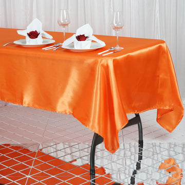 Add a Pop of Color to Your Event with the Orange Satin Tablecloth