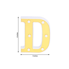 Indoor lighting: a yellow plastic letter d is 6 inches tall and 5 inches wide