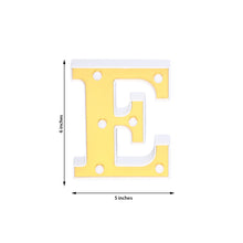 A White | Gold Marquee Light in the shape of a letter E, made of Plastic Frame