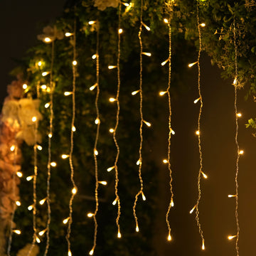 Illuminate Your Space with Warm White 96 LED Icicle Curtain Fairy String Lights