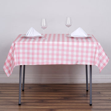 Elevate Your Event Decor with the White/Rose Quartz Seamless Buffalo Plaid Square Tablecloth