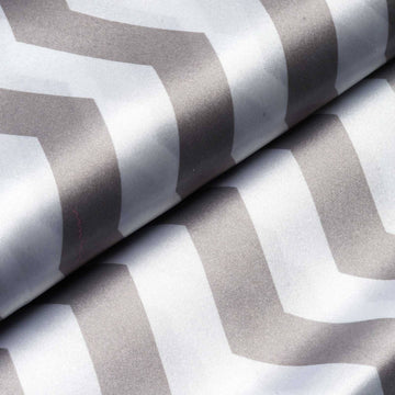 Elevate Your Event Décor with the Silver/White Chevron Print Satin Fabric Roll