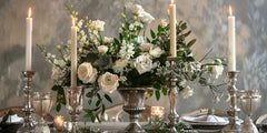 DIY centerpiece ideas: candles and white flowers elegance.