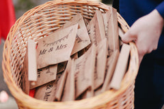 Wedding favors in a wooden basket