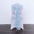 Light blue chair sash with ruffles on a white chair.