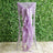 Lavender chair sash draped elegantly on a silver chiavari chair.