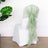 Elegant green chair sash tied in a bow on a white chair.