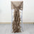 Brown ruffled chair sash draped elegantly over a white chair.