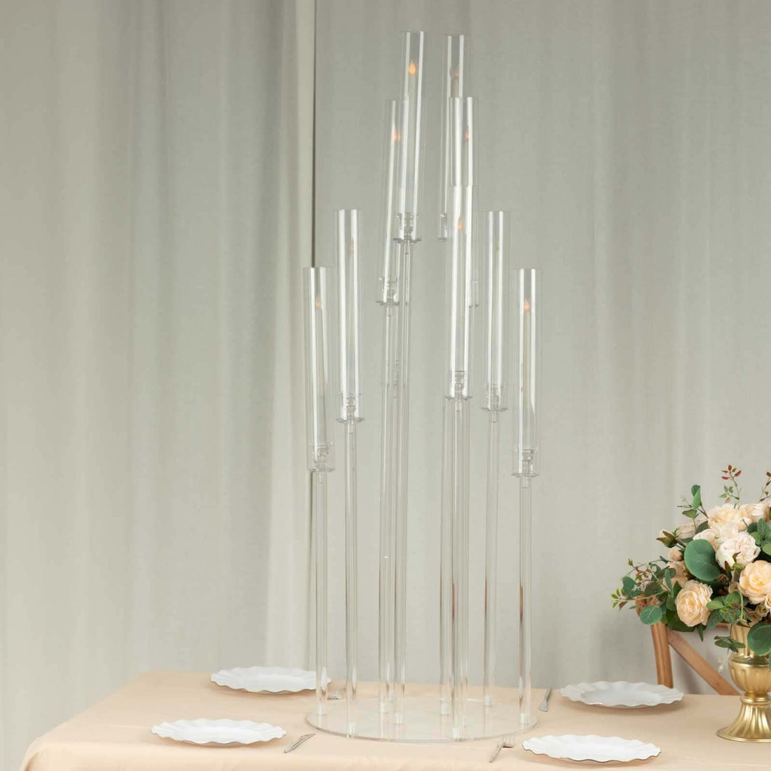 Modern glass candle holder centerpiece with multiple clear tubes.