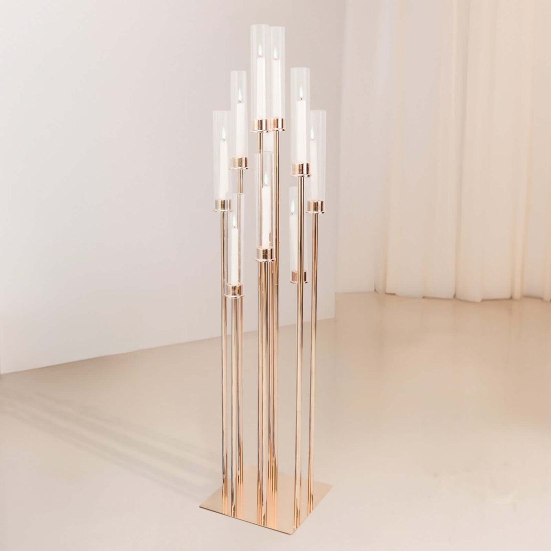 Elegant rose gold floor lamp with glass shades, perfect for modern decor.