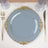 Elegant gray plate with gold ornate rim on a dining table setting.