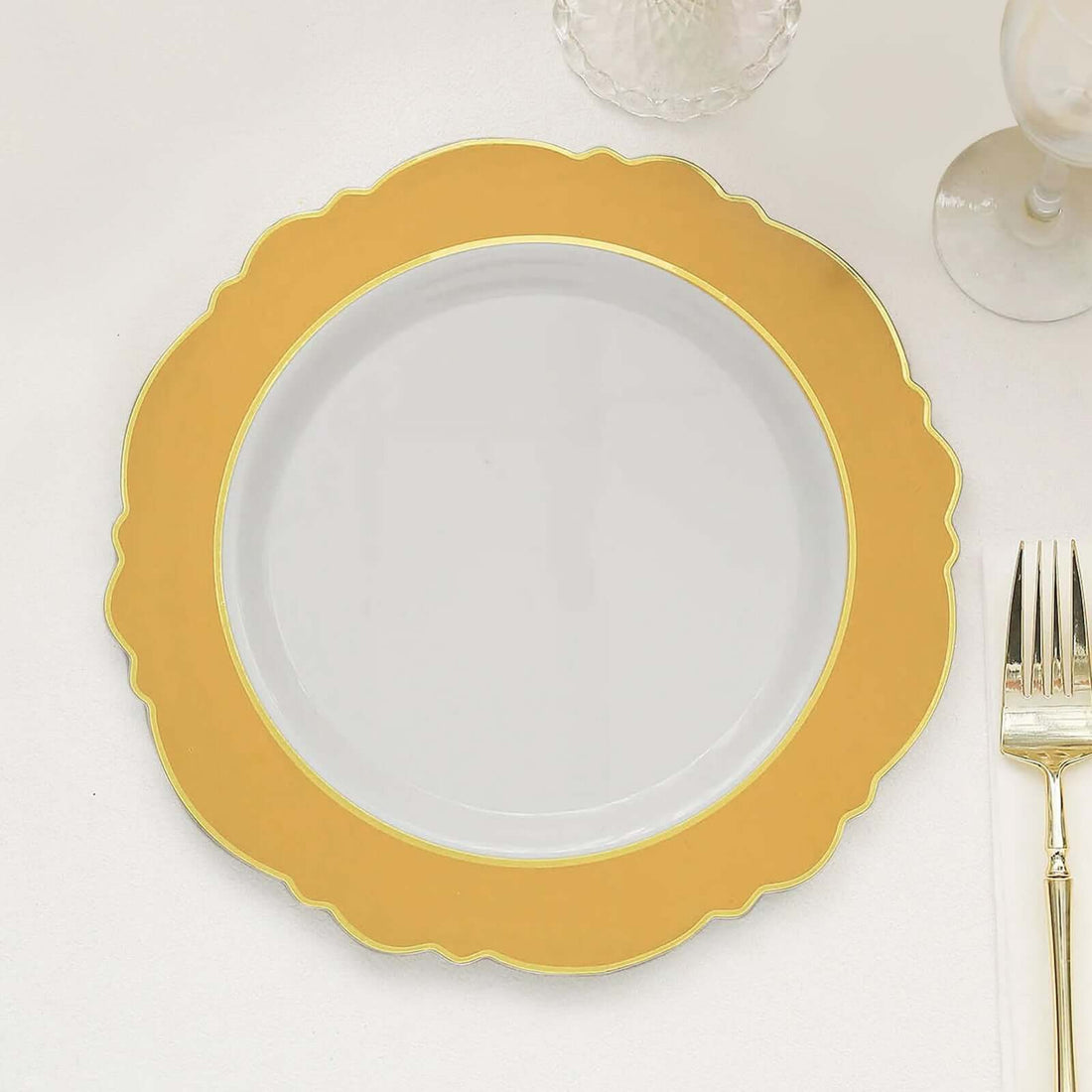 Elegant gold rimmed plate on a white background