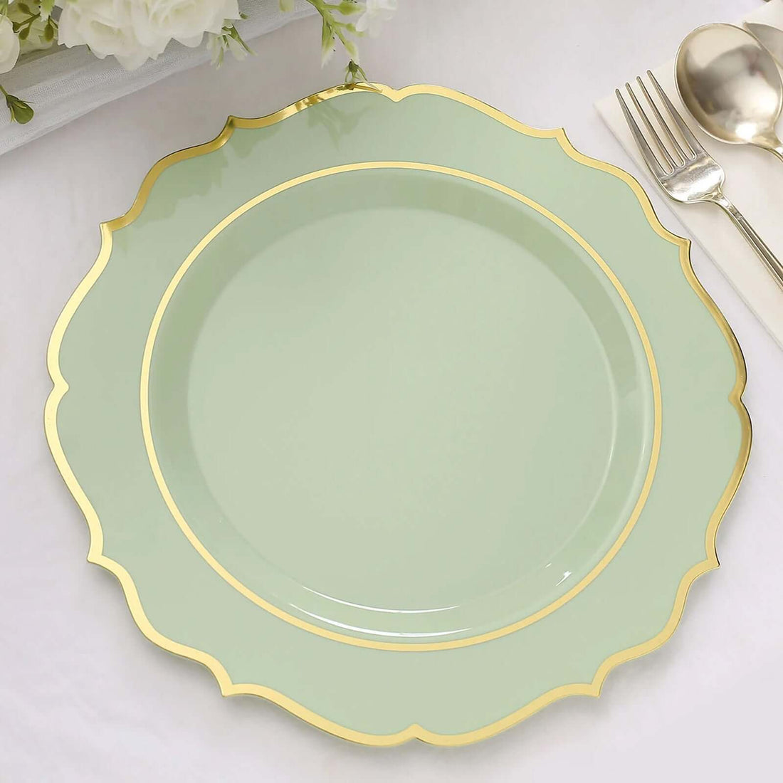 Elegant mint green plate with gold rim detail