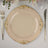 Elegant gold-trimmed dinner plate on a table setting.