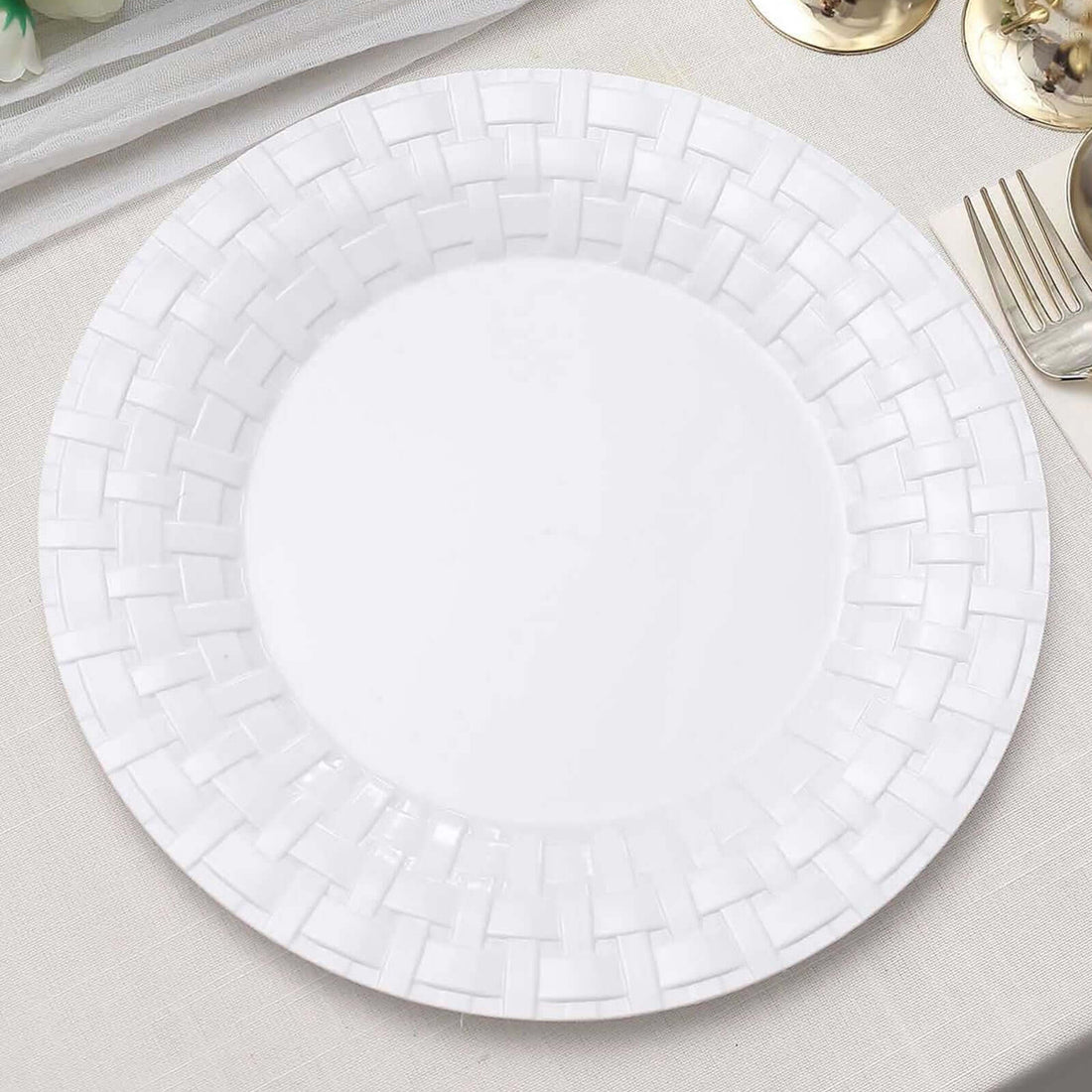 White decorative plate with a woven pattern design