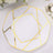 Elegant octagonal plate with gold geometric design on a white background