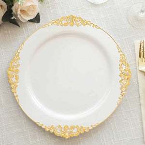 Elegant white dinner plate with gold ornate border design.