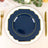 Elegant navy blue dinner plate with gold trim on a decorative table setting.