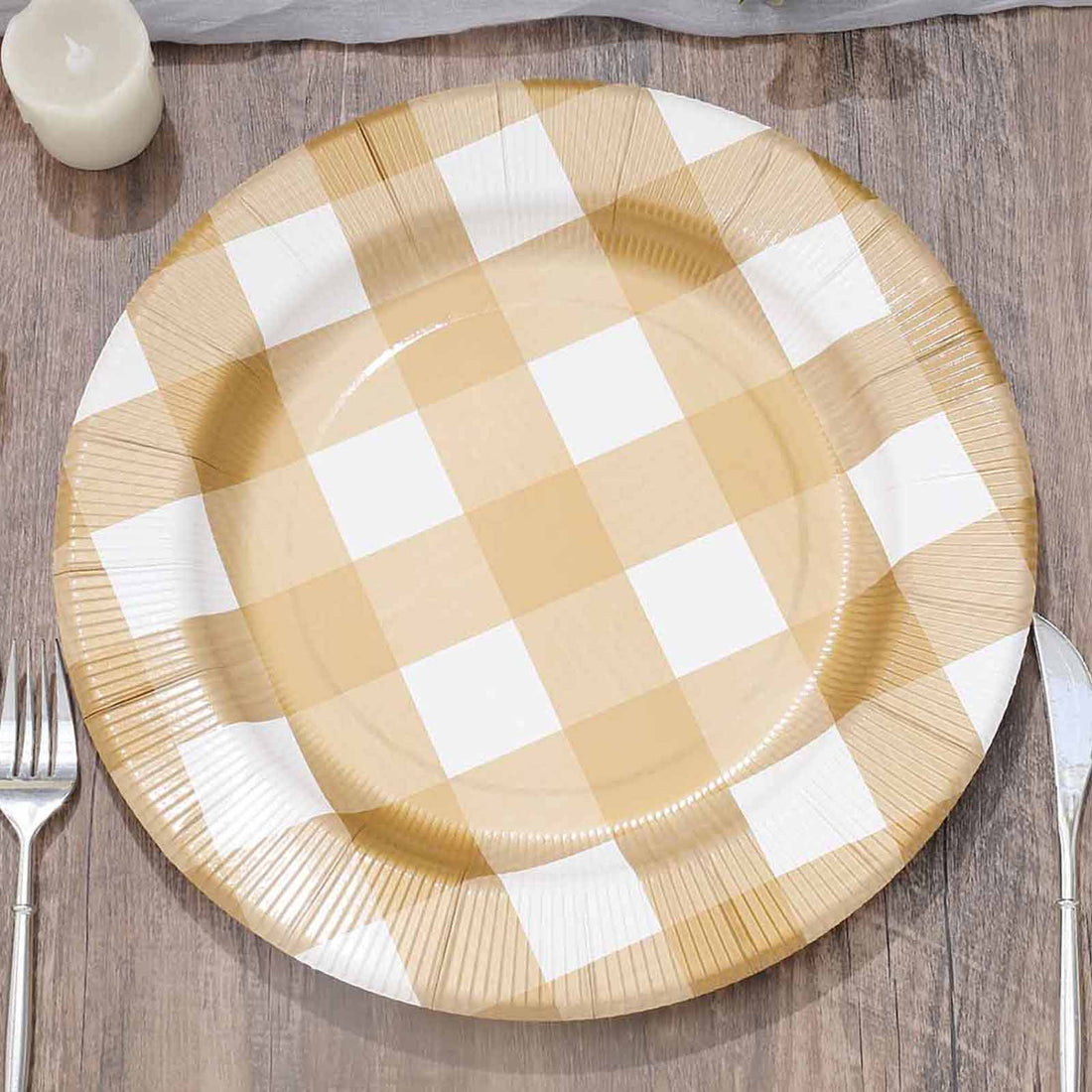 Yellow plaid disposable plate on a wooden table setting.