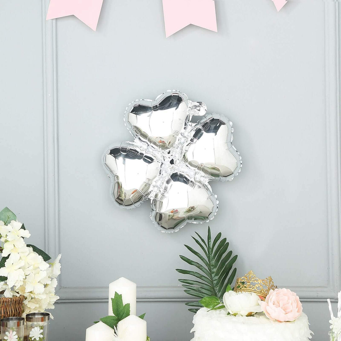 Silver heart-shaped balloons for festive decorations.