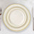 Elegant white dinner plates with gold trim in a stacked arrangement.